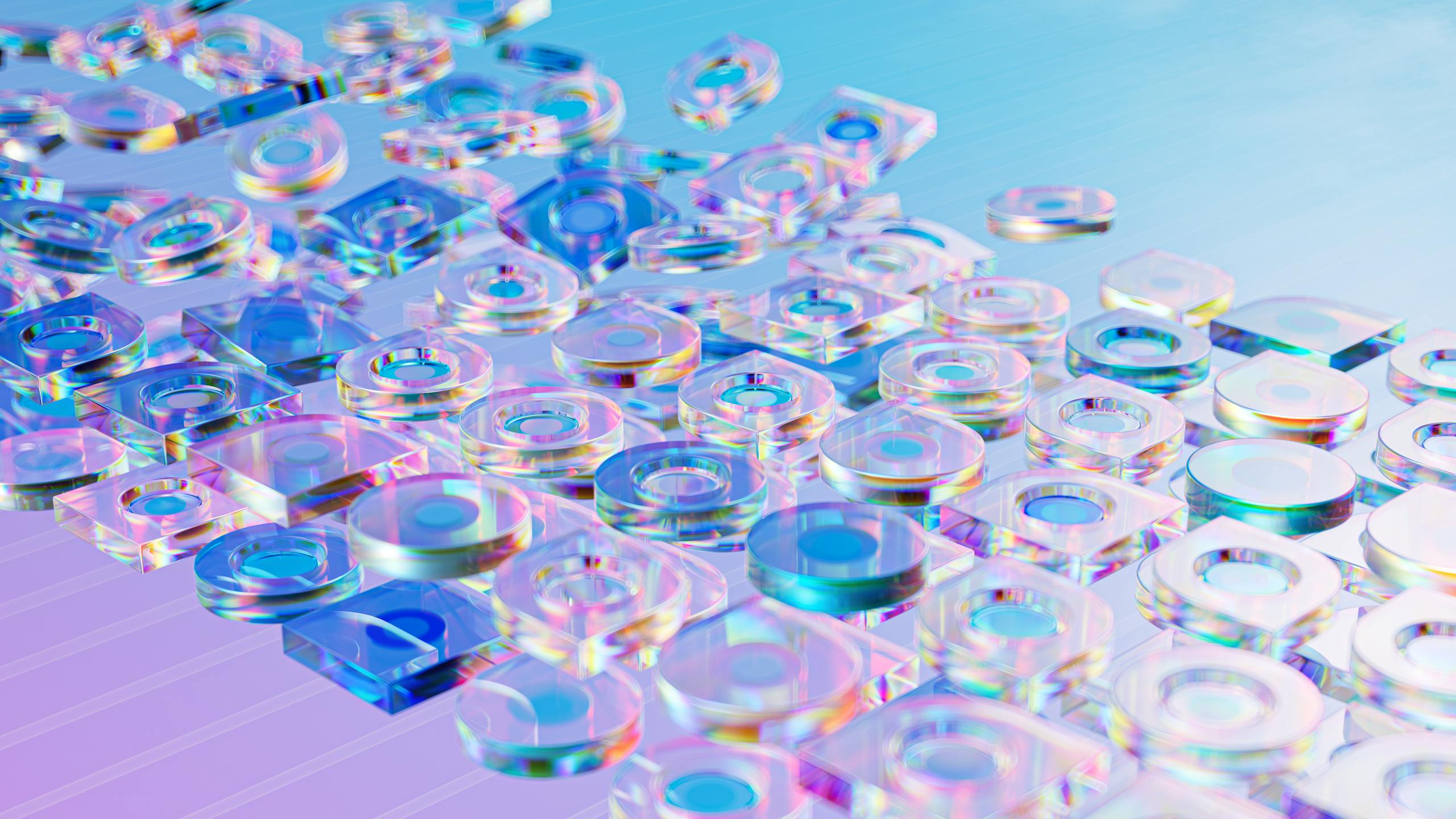 Vibrant holographic glass objects creating a futuristic abstract design.